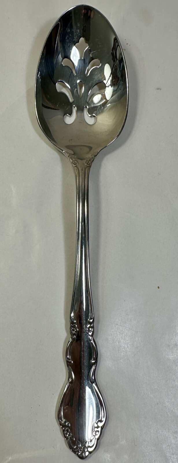One Oneida Dover Stainless Pierced Tablespoon (Serving Spoon) - 8 3/8"
