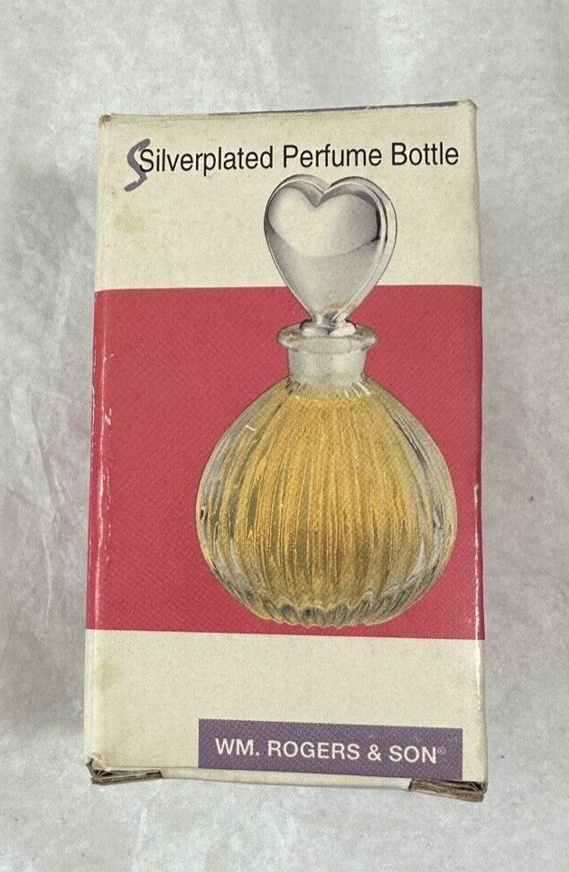 UNOPENED: WM Rogers Clear Glass Perfume Bottle With Silverplated Heart Stopper - Image 1