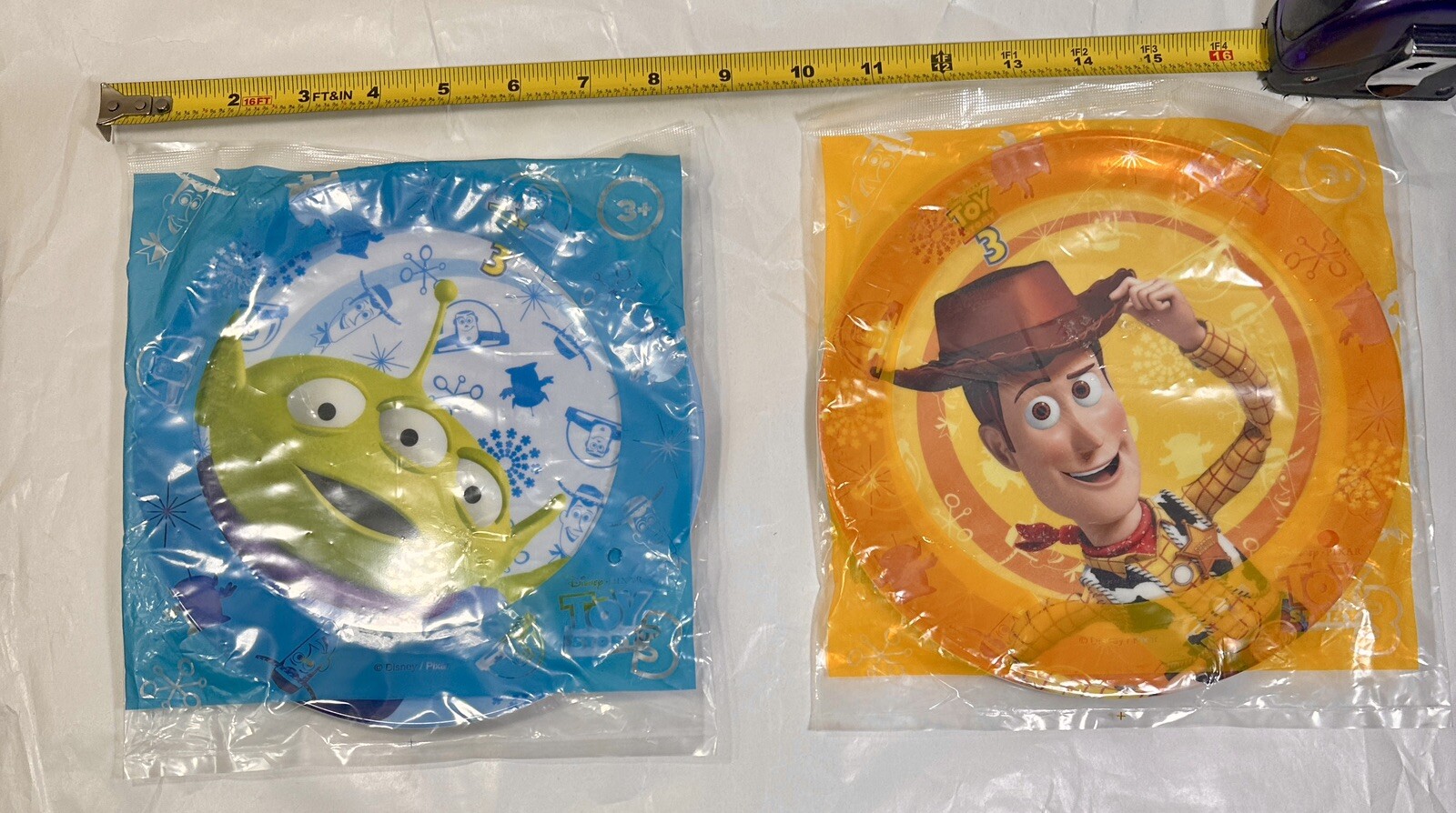 Set of Two (2) Toy Story 3 Melamine Plates - Sherriff Woody and the Alien - Image 1